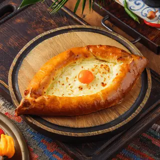 Хачапури по-аджарски — Ресторан Халиф